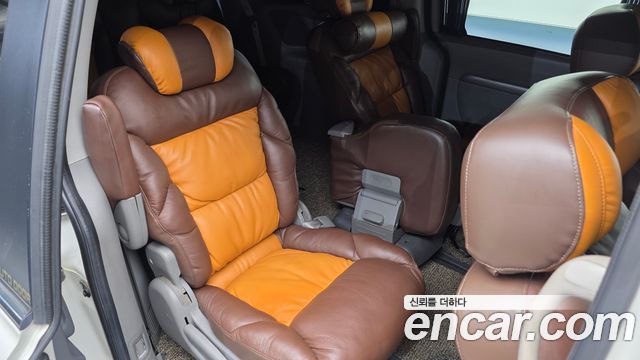 Kia Canival 2010 — photo 12