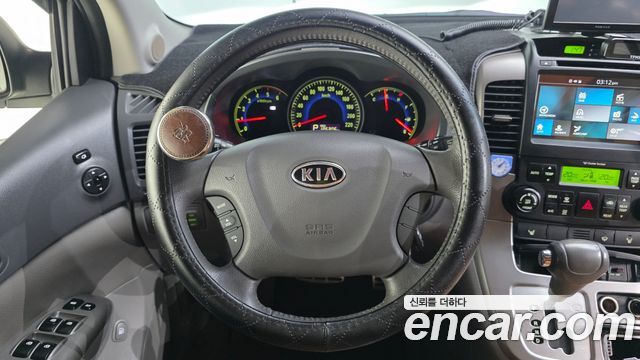Kia Canival 2010 — photo 13