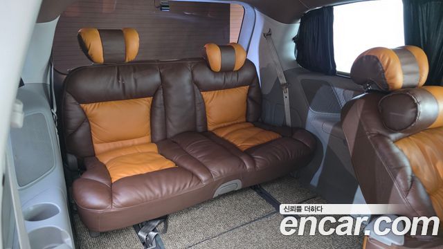 Kia Canival 2010 — photo 17