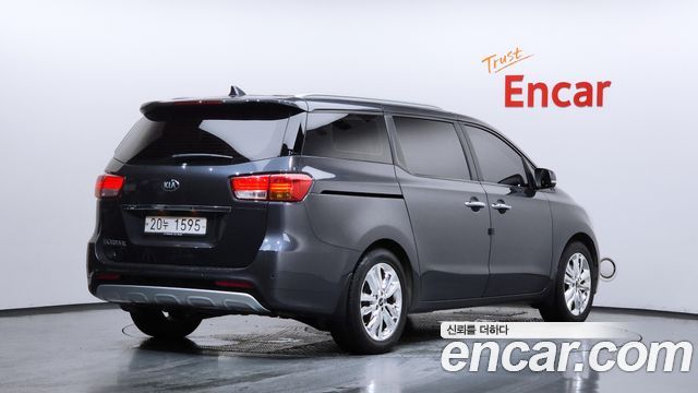 Kia Canival 2015 — photo 2