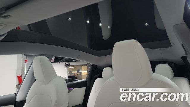 Tesla Model Y 2025 — photo 25
