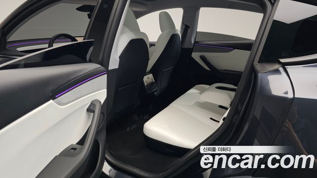 Tesla Model Y 2025 — photo 16
