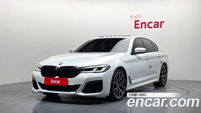BMW 5-Series 2022 — photo 1