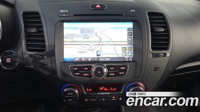 Kia K3 2013 — photo 20