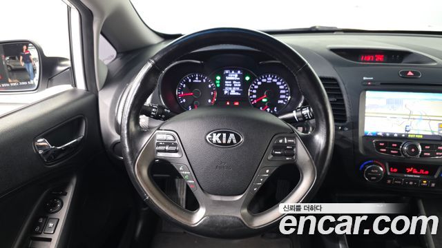 Kia K3 2013 — photo 21