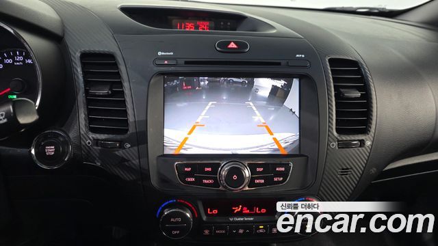 Kia K3 2013 — photo 22