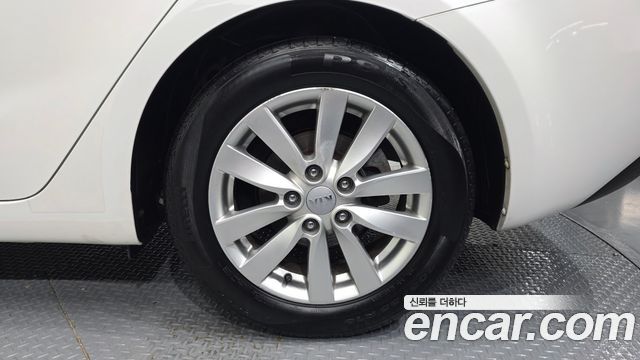 Kia K3 2013 — photo 7
