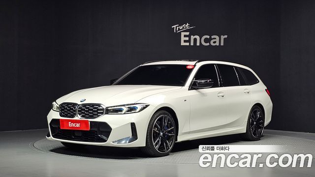 BMW 3-Series 2023 — photo 1