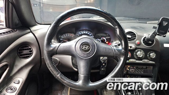 Hyundai Tiburon 1999 — photo 19