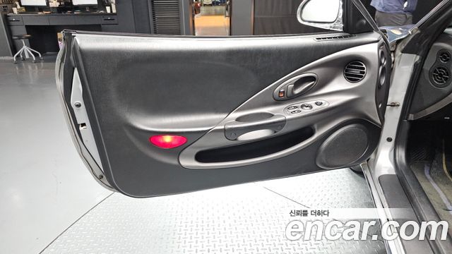 Hyundai Tiburon 1999 — photo 14