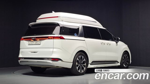 Kia Canival 2023 — photo 2