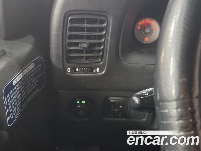 KG Mobility KORANDO 2004 — photo 9