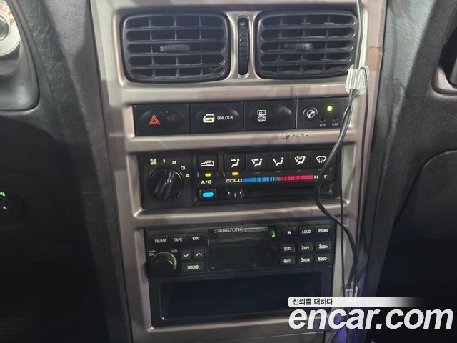 KG Mobility KORANDO 2004 — photo 14