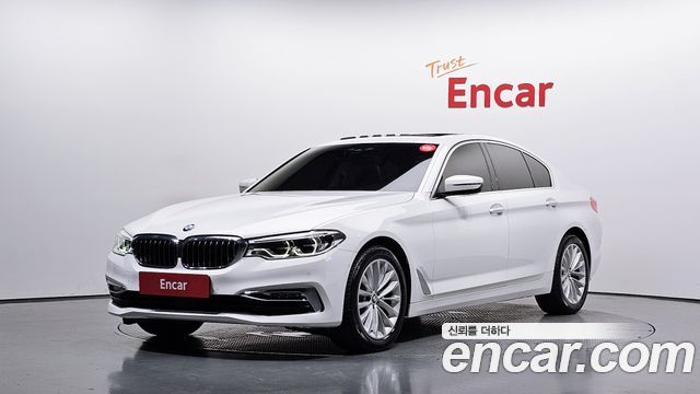 BMW 5-Series 2018 — photo 1