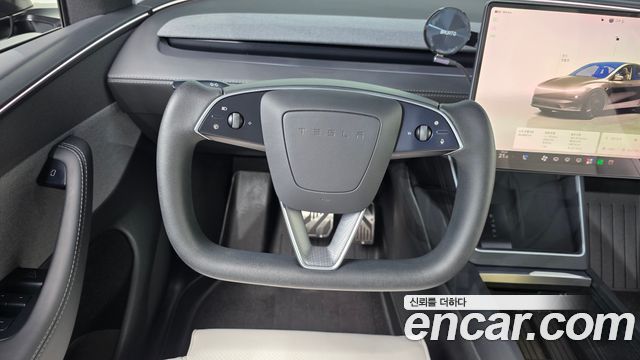 Tesla Model Y 2025 — photo 19