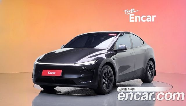 Tesla Model Y 2025 — photo 1