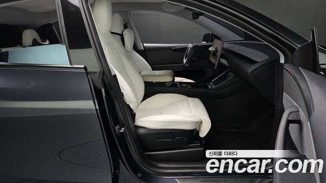 Tesla Model Y 2025 — photo 16
