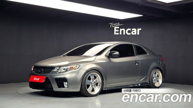 Kia Porte 2011 — photo 1