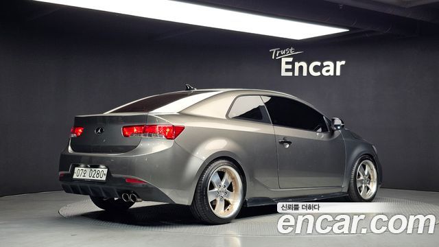 Kia Porte 2011 — photo 2