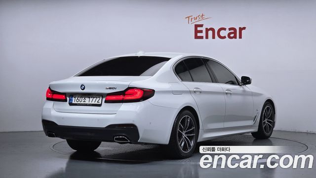 BMW 5-Series 2023 — photo 2