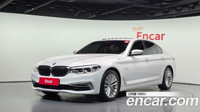 BMW 5-Series 2018 — photo 1