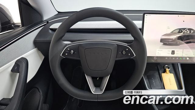 Tesla Model Y 2025 — photo 19