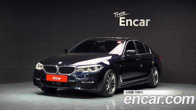 BMW 5-Series 2018 — photo 1
