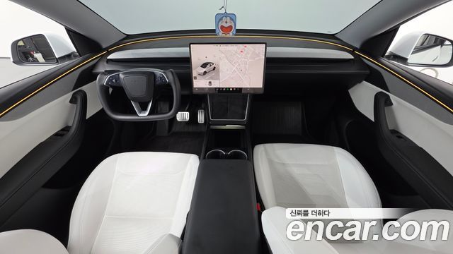 Tesla Model Y 2025 — photo 10