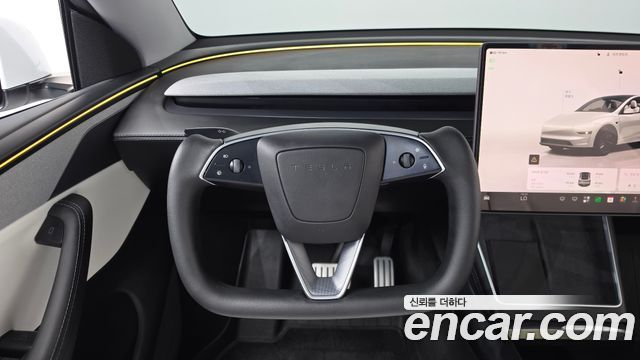 Tesla Model Y 2025 — photo 18