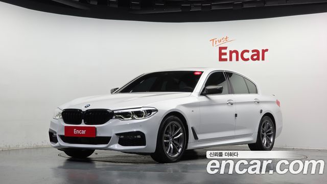 BMW 5-Series 2018 — photo 1