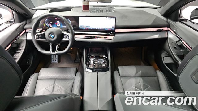 BMW 5-Series 2024 — photo 10