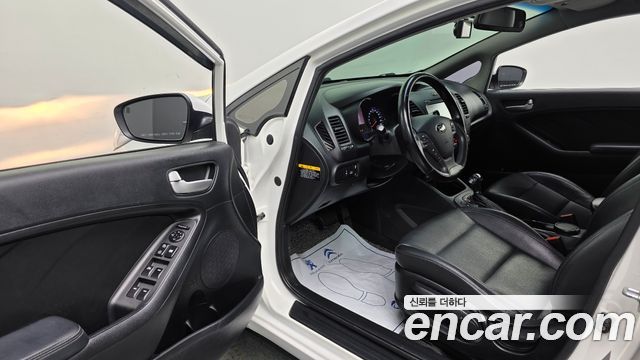 Kia K3 2013 — photo 10