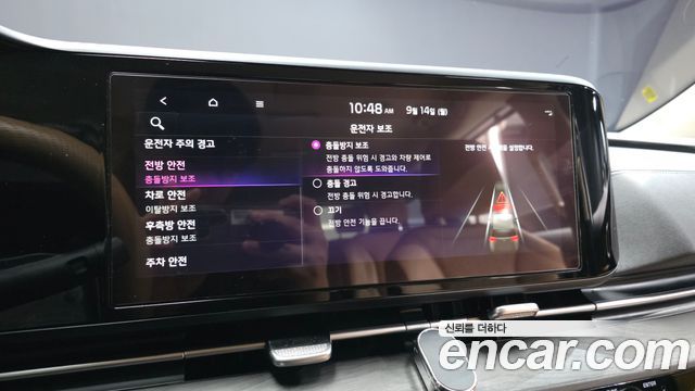 Kia Canival 2023 — photo 17