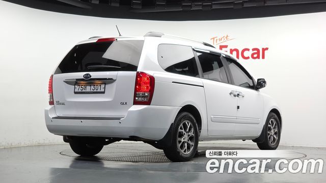 Kia Canival 2014 — photo 2