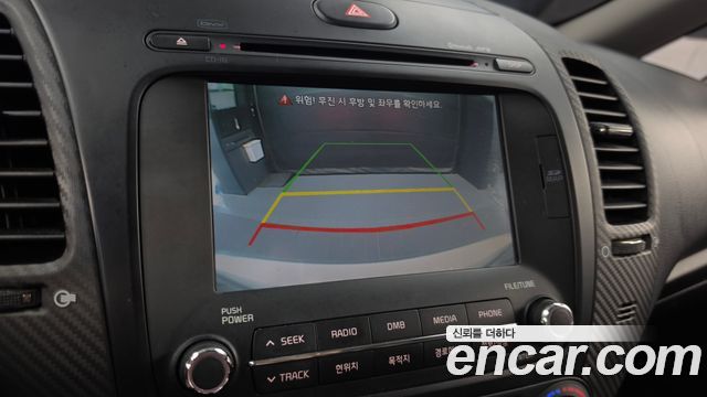 Kia K3 2015 — photo 21