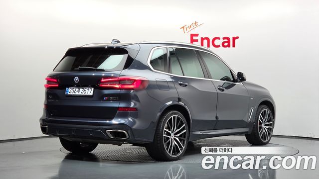 BMW X5 2022 — photo 2