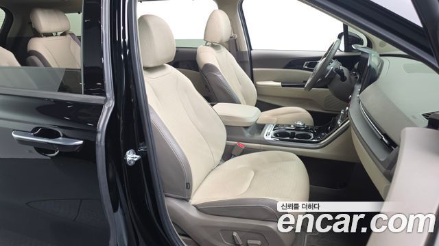 Kia Canival 2023 — photo 12