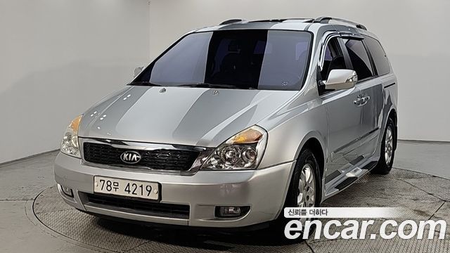 Kia Canival 2013 — photo 1