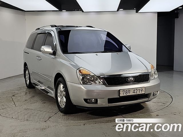 Kia Canival 2013 — photo 2