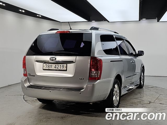 Kia Canival 2013 — photo 4