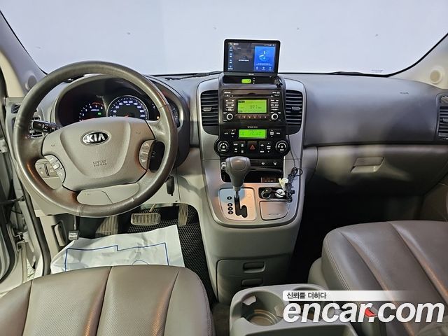 Kia Canival 2013 — photo 5