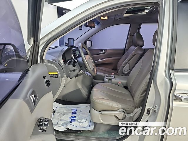 Kia Canival 2013 — photo 11