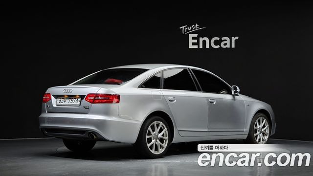 Audi A6 2010 — photo 2