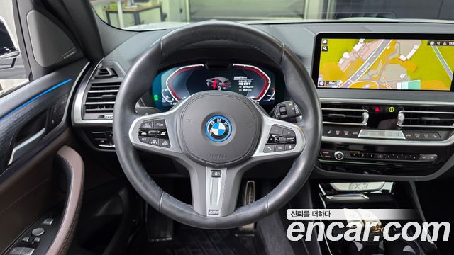 BMW iX3 2024 — photo 19