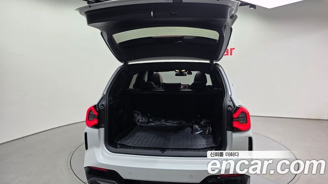 BMW iX3 2024 — photo 36