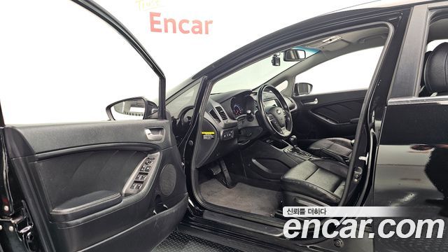 Kia K3 2015 — photo 13