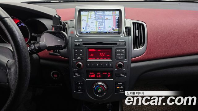 Kia Porte 2012 — photo 21