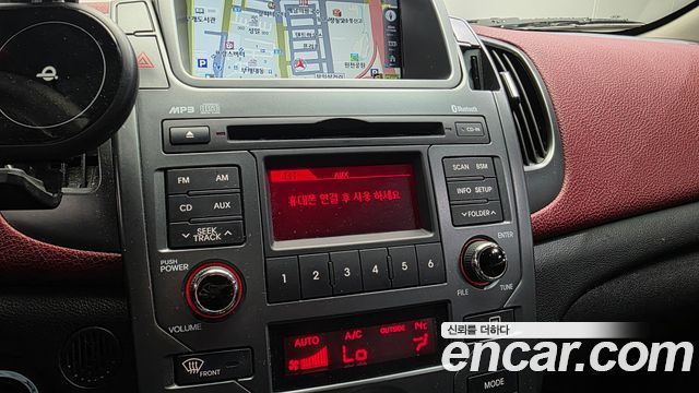 Kia Porte 2012 — photo 31