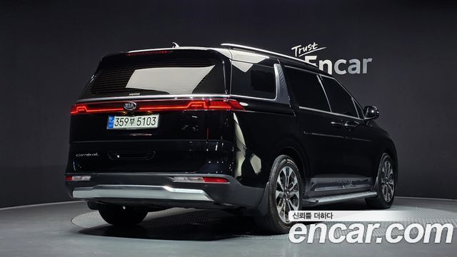 Kia Canival 2021 — photo 2