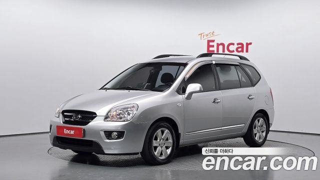 Kia Carens 2009 — photo 1